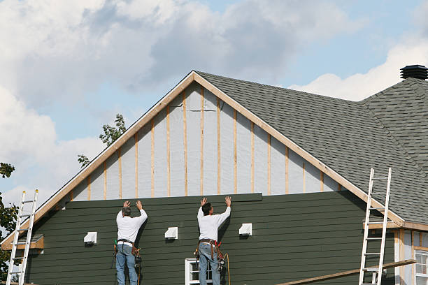 Professional Siding Installation technician working in Hyde Park, MA